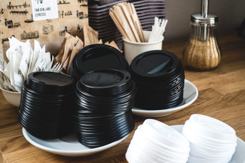 Plastic coffee cup lids