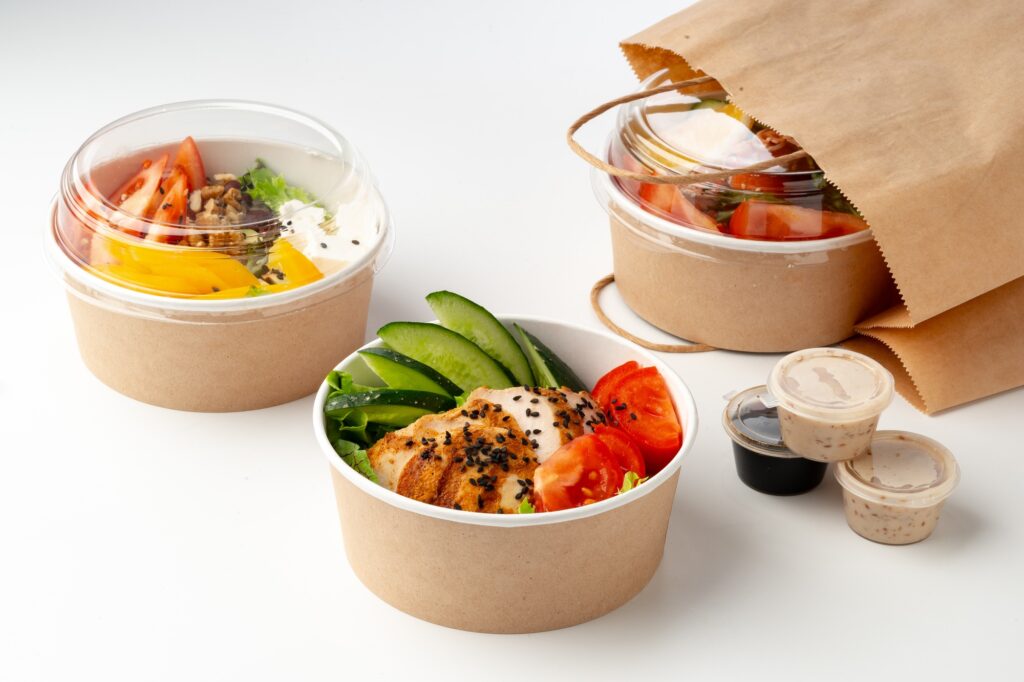 Take out poke bowls with craft bag isolated on white background